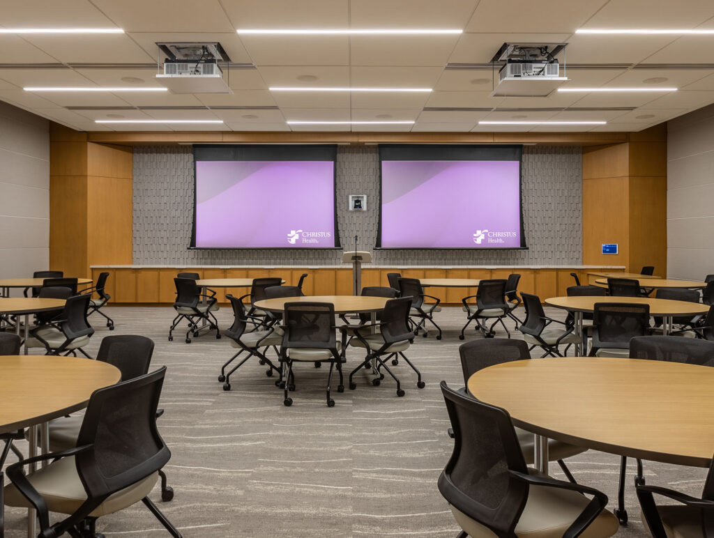 Two-123” projection screens and projectors along with 4K displays adorn the Chapel and Heritage Center while a large video wall consisting of four-55” displays and eight-65” 4K displays update the Security Operations Center