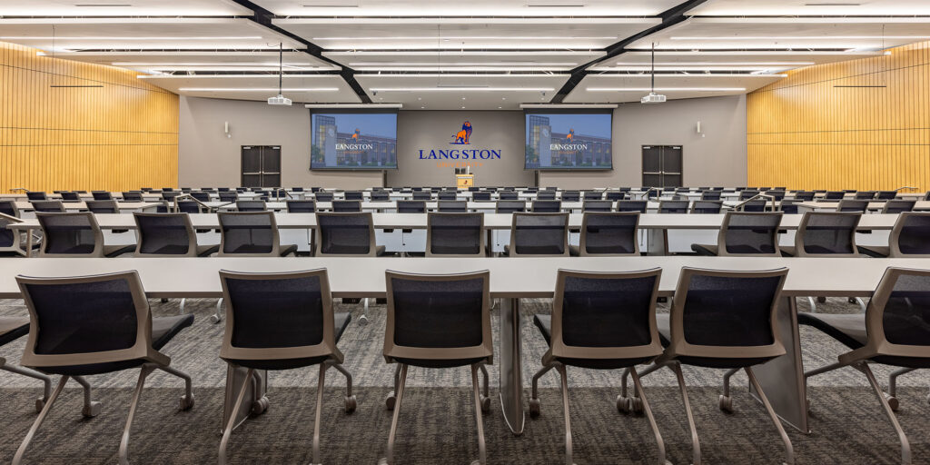 Langston University Tulsa has a 110” x 176” HD Da-Lite screen and mounted projector combine with ceiling mounted PTZ cameras