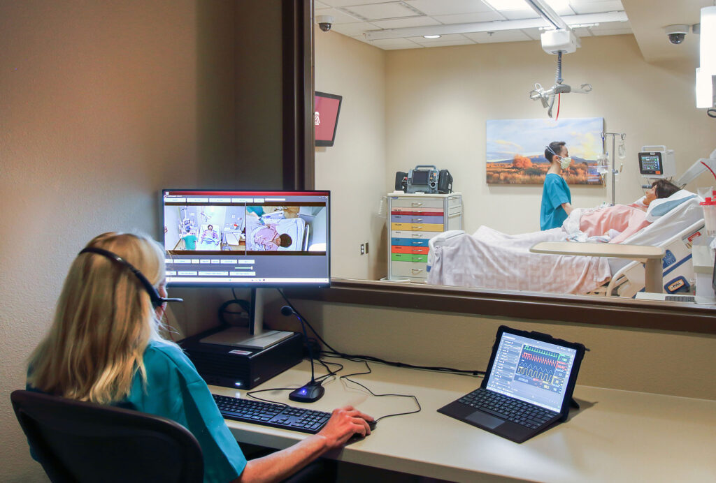 Albuquerque Simulation Health Simulation Center includes 2-way ceiling speakers for sound reinforcement, wireless microphone combo systems for flexibility, and networked ceiling speakers for overhead paging and sound effects